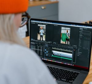 Woman Editing Video on Computer